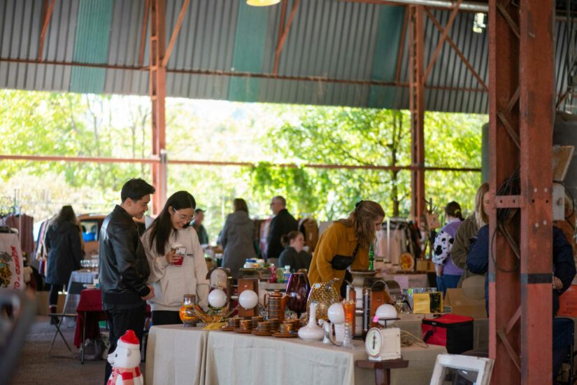 People shopping at an outdoor market.