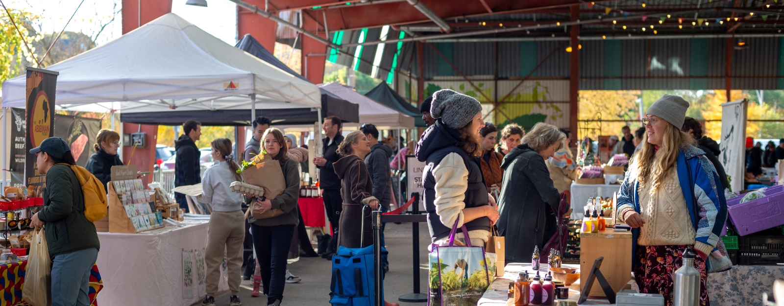 People walking around the Saturday Farmers Market at Evergreen Brick Works