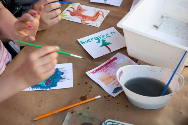 kids painting on a table