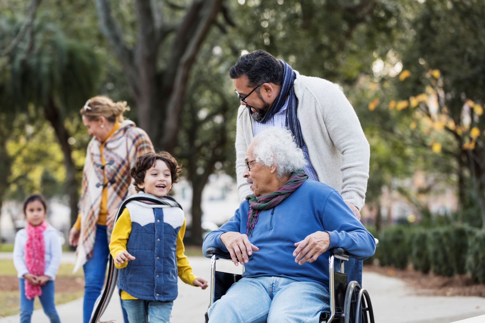 Multi-generational family in public park