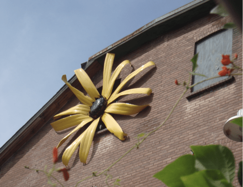 flower art on side of brick building