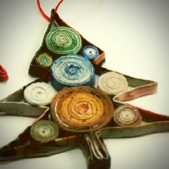 Recycled rolled paper Christmas tree shaped decoration.