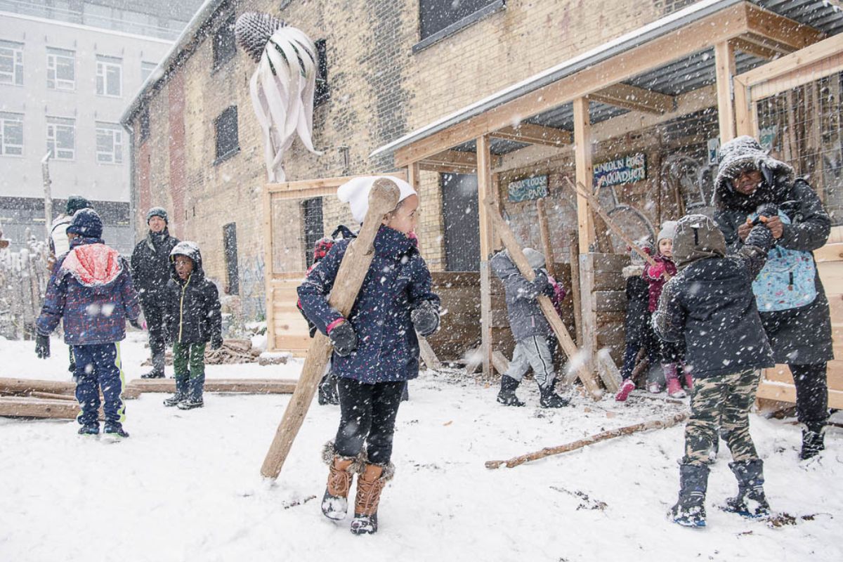 Weekend Nature Play in a snowy Children's Garden.