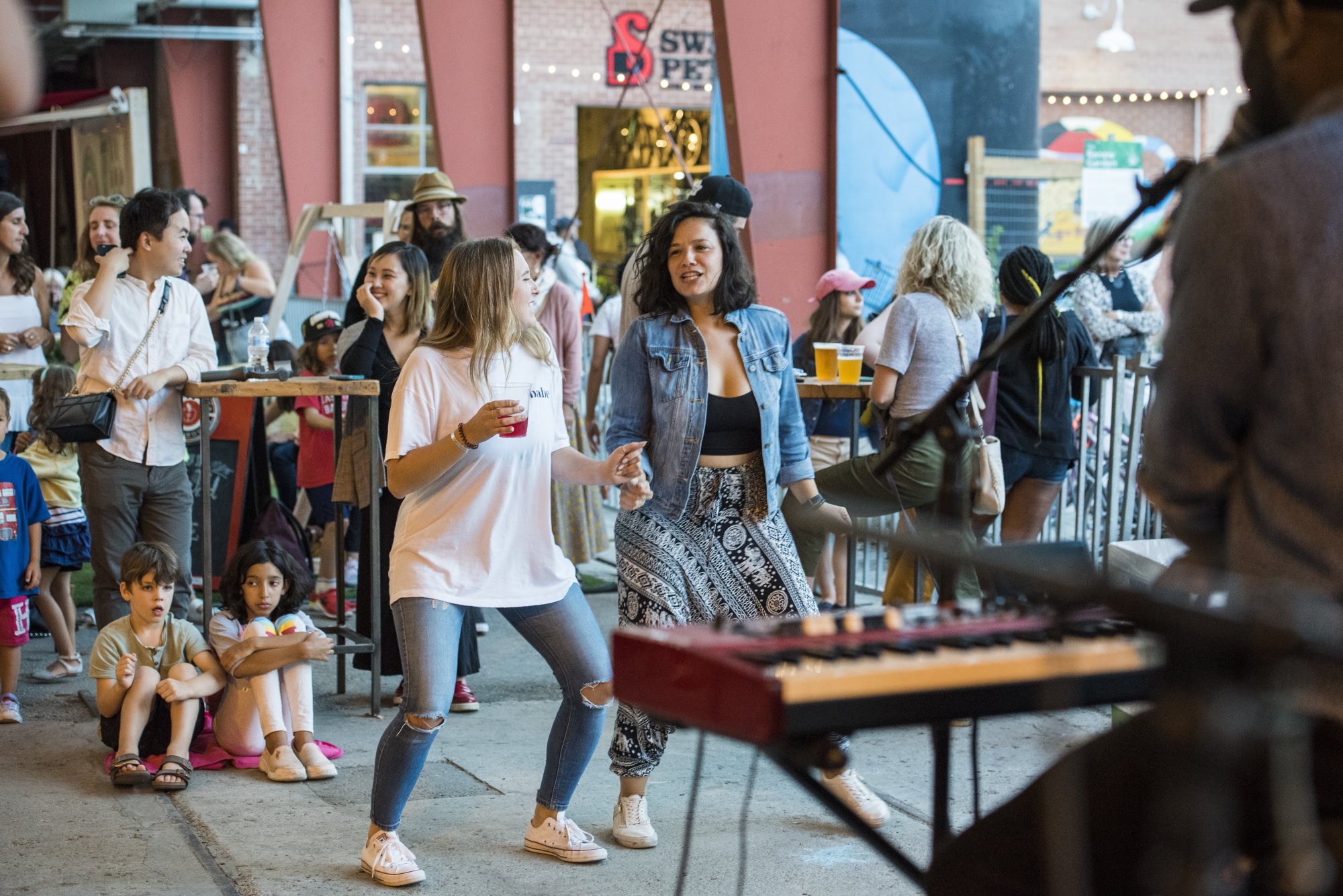 People dancing at Evergreen Brick Works summer event