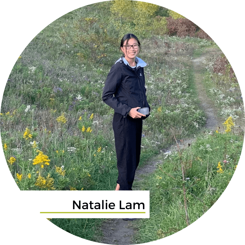 Natalie Lam standing in field outdoors