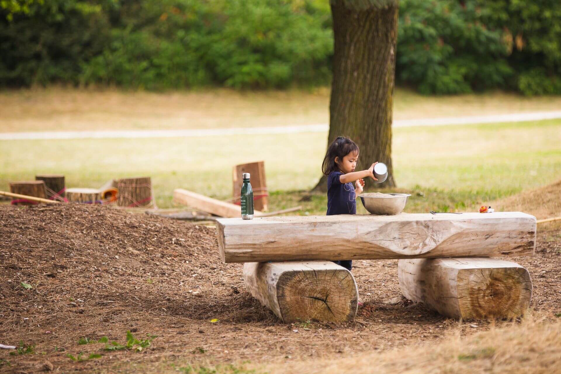 Child playing in outdoor classroom