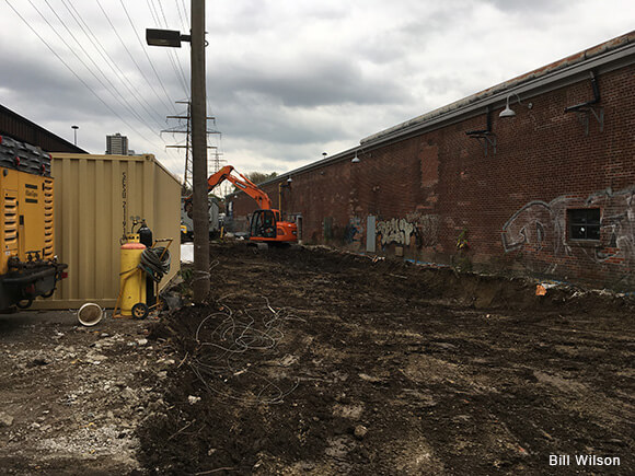 Geothermal construction gets underway just outside the kiln building at Evergreen Brick Works.