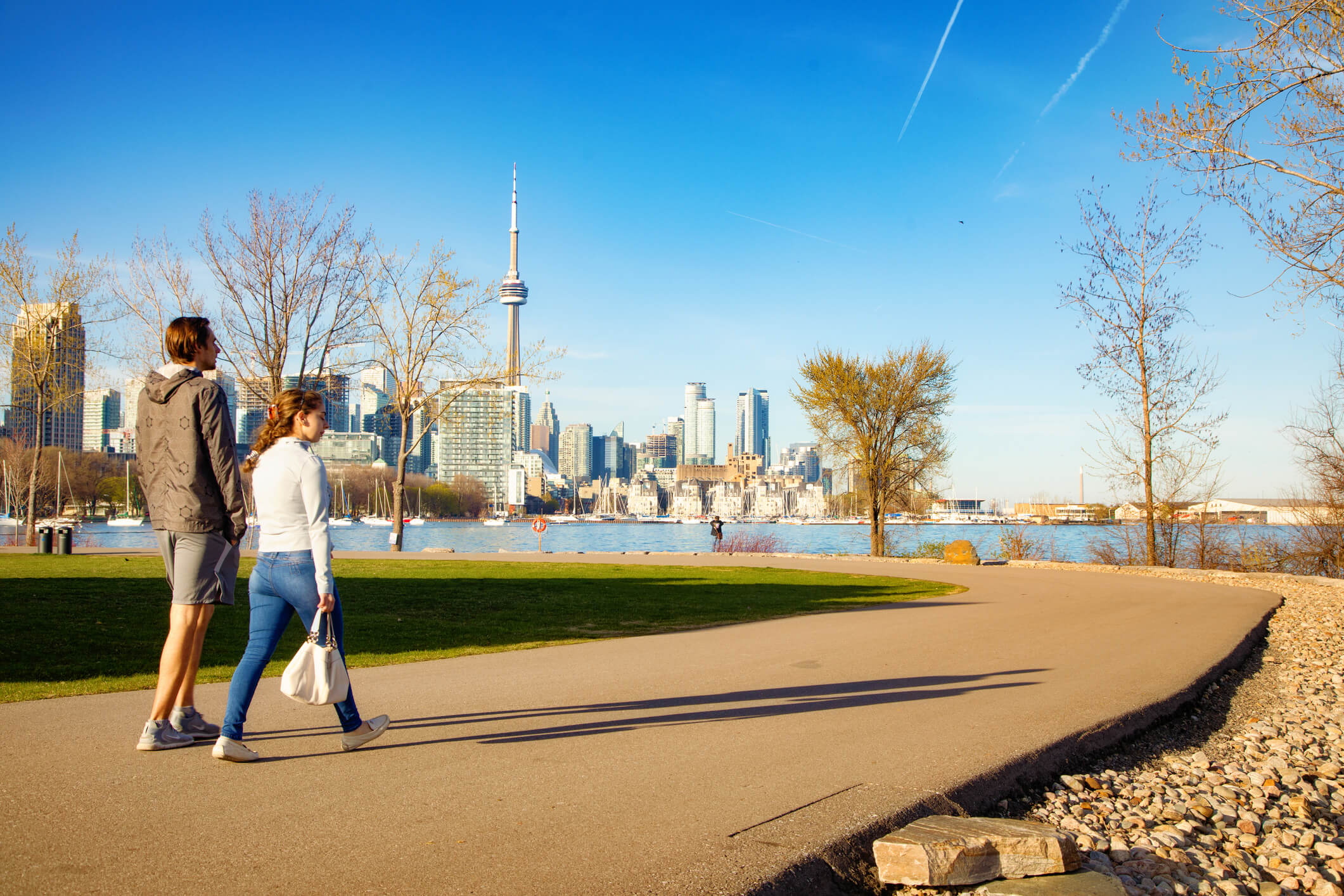Couple walking on path Toronto