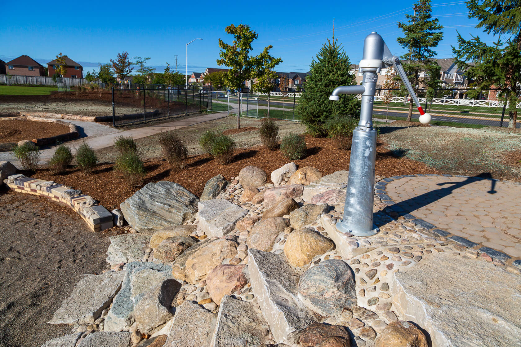 Water play feature in playground